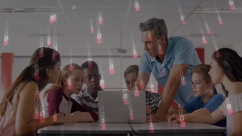 Teacher pointing at laptop starting coding lesson while students leaning and Video stock 313240851