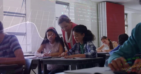 Teacher pointing at notes guiding front students, transparent data graphs Video stock 312298134