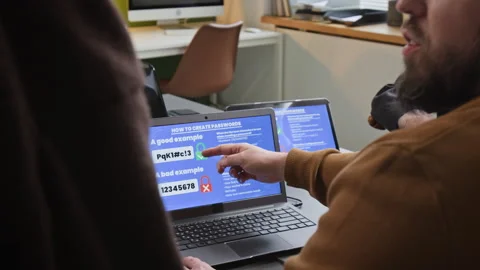 Teacher Pointing to Safe Passwords in Computer Literacy Class Stock Footage 333757930