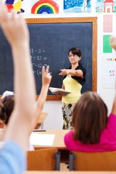 Teacher pointing at students Stock Photos