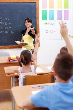 Teacher pointing at students Stock Photos