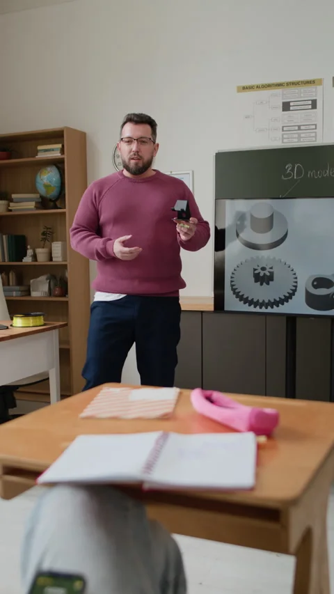 Teacher Presenting 3D Modeling Topic To Students In Classroom Stock Footage 335689535