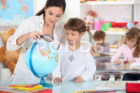 Teacher, pupil, reading, globe Stock Photos