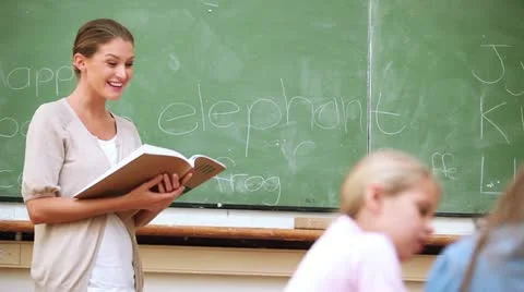 Teacher reading a book Stock-Footage 10844027