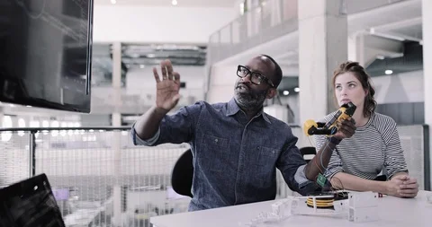 Teacher in a robotics engineering class Stock Footage 116500889