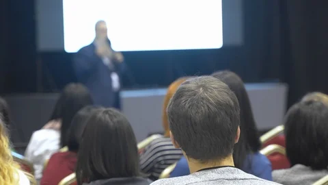 Teacher, scientist lectures in front of a audience in a large hall in university Stock-Footage 111160453