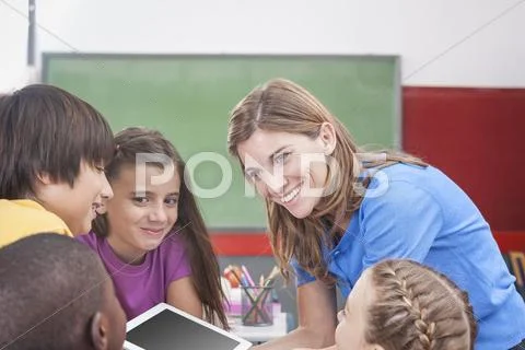 The teacher showing something Stock Photos