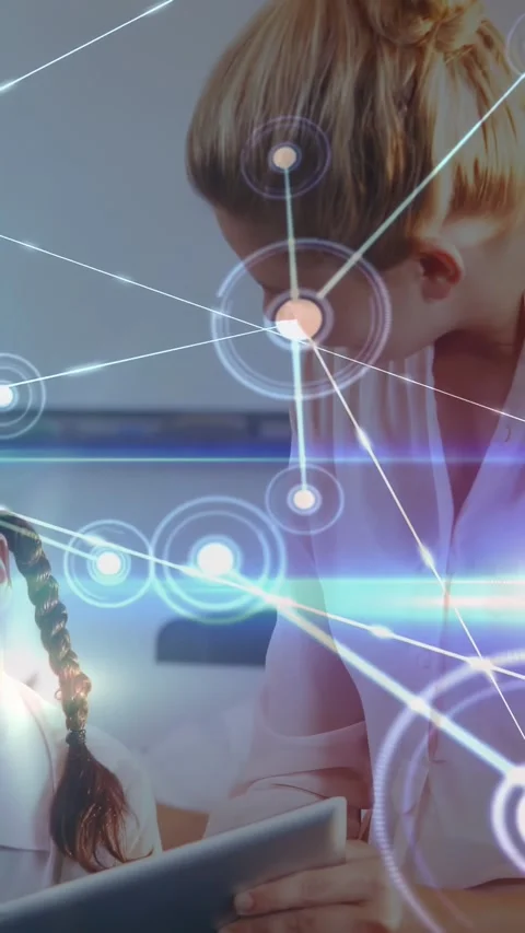 Teacher showing tablet to pupil causing animated node network expanding across Stock Footage 331350028