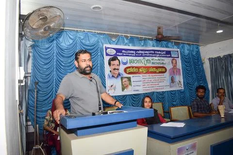 A teacher is speaking in the inauguration of a function Stock Photos