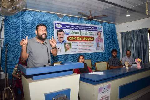 A teacher is speaking in the inauguration of a function Stock Photos