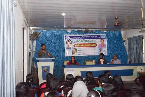 A teacher is speaking in the inauguration of a function Stock Photos