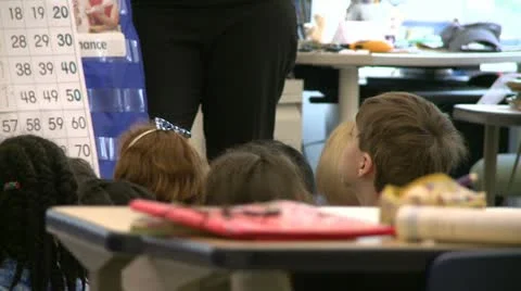 Teacher standing in front of grammar school class (4 of 6) Stock Footage 8979331