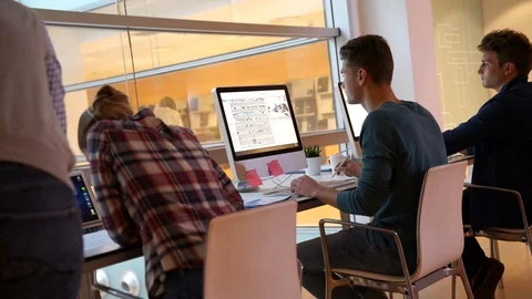 Teacher with students in computing class Stock Footage 86521023