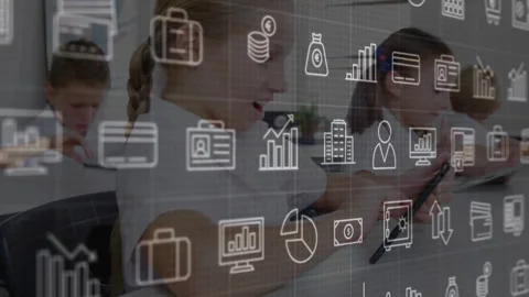 Teacher tapping tablet launching learning module and causing finance icons 库存影片 316186347