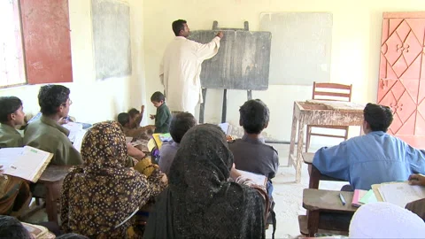 Teacher teaching in classroom Stock Footage 202127395