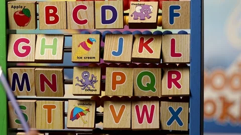 Teacher Teaching to Read the Vowels One by One in 4k Stock Footage 94885337