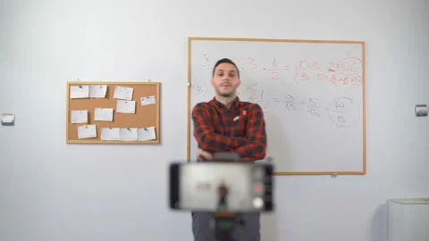 Teacher Teaching Remotely say hi or bye Stock Footage 139280770