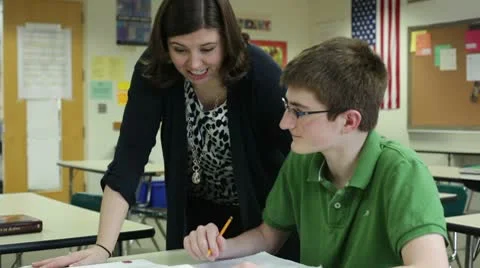 Teacher tutoring student Video stock 10787762