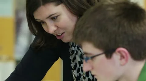 Teacher tutoring student Video stock 10787824