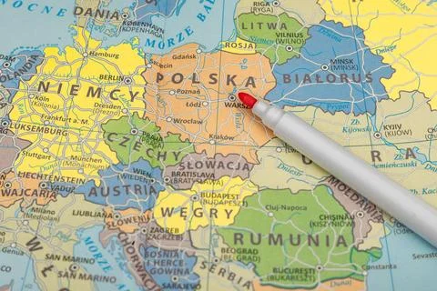 The teacher uses a pointer to show the location of Poland on the map, a pol.. Stock Photos