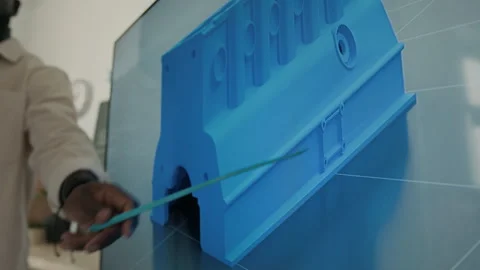 Teacher Using Pointer to Highlight Details on Screen During 3D Modelling Class 動画素材 301917078