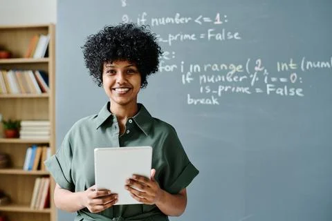 Teacher using tablet pc at lesson Stock Photos