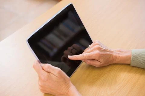 Teacher using tablet pc 스톡 사진