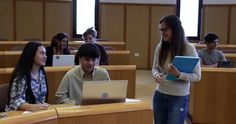 Teacher working with students inside classroom at school university Stock Footage 203727710