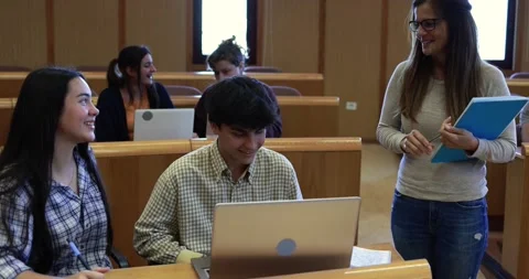 Teacher working with students inside classroom at school university Stock Footage 203727762