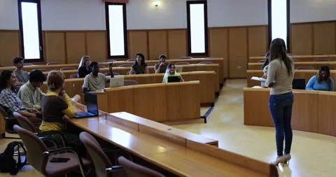 Teacher working with students inside classroom at school university Stock Footage 203728041