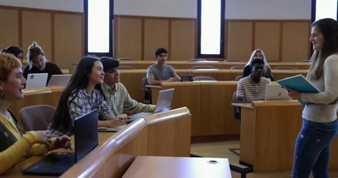 Teacher working with students inside classroom at school university Stock Footage 203728876