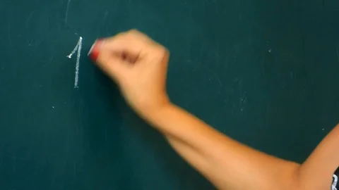 The teacher writes homework Stock Footage 93735604