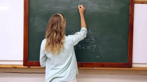 teacher writing on board