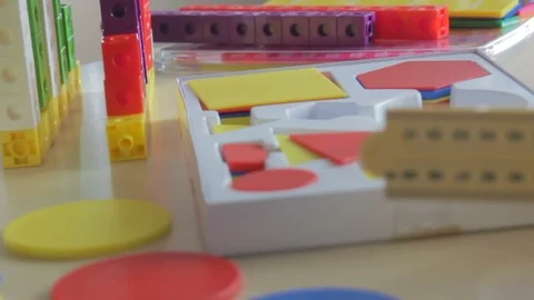 Teachers arranging toys at the table Stock Footage 87629941