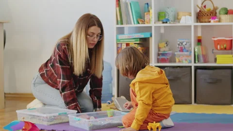 The teacher's dedication to her profession is reflected in the success of her Stock Footage 249658158