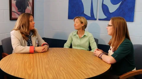 Teachers talking with principal Video stock 37212321