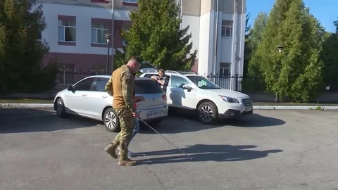 Teaching the blind to walk with a cane. A blind war veteran moves with a cane. Stock Footage 300197192
