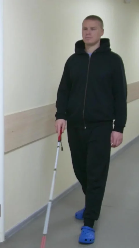 Teaching the blind to walk with a cane. Stock Footage 300438095