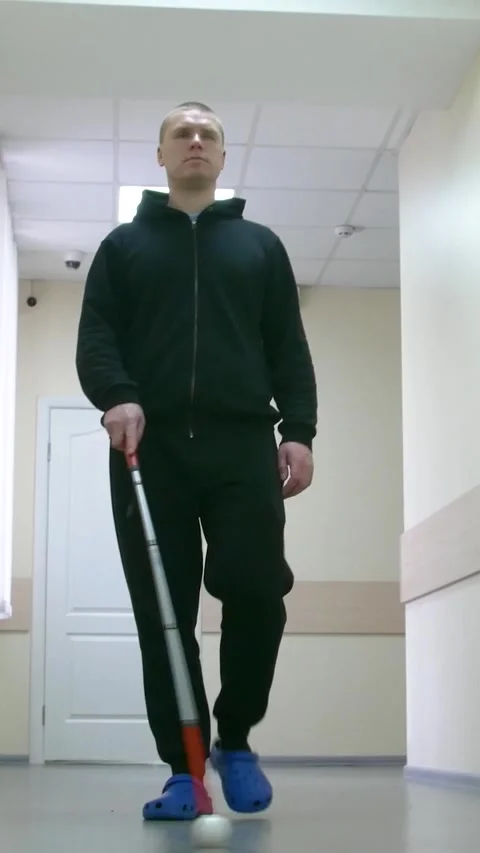 Teaching the blind to walk with a cane. Video stock 300438134