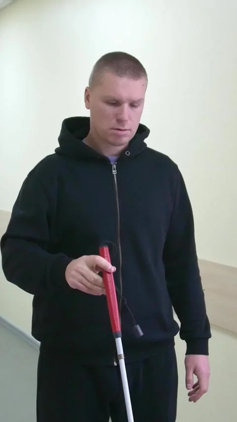 Teaching the blind to walk with a cane. Stock Footage 300438145