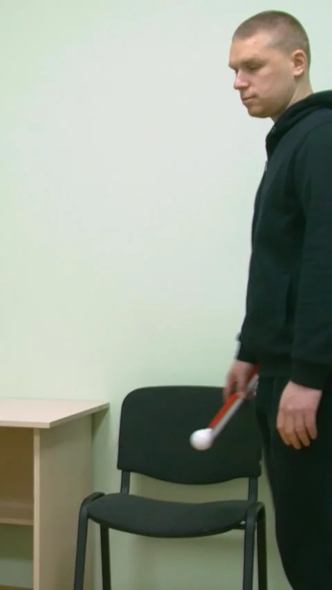 Teaching the blind to walk with a cane. Stock Footage 300438397