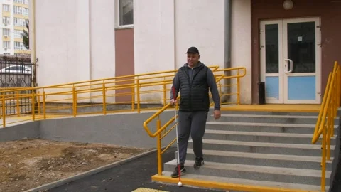 Teaching the blind to walk with a cane. Stock Footage 303358226