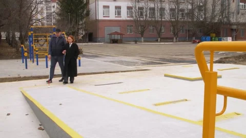 Teaching the blind to walk with a cane. Stock Footage 303358436