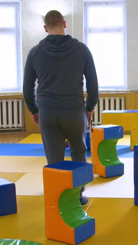 Teaching the blind to walk with a cane. Vertical video. Stock Footage 303416024