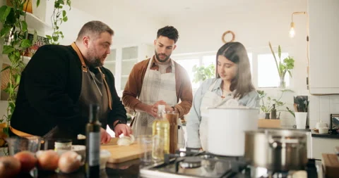 Teaching, chef and people in kitchen, cutting board and mentor for internship Stock Footage 283438603