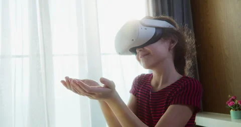 Teaching children using a virtual reality headset. Child education in virtual Stock Footage 242047988