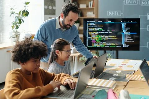 Teaching Coding Skills to Diverse Group of Children 스톡 사진