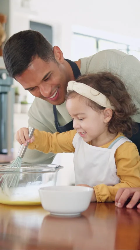 Teaching, egg and kid baking with father in kitchen for recipe preparation in Stock-Footage 335369326