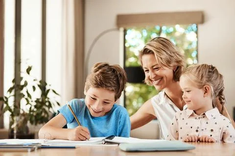 Teaching, help and homework with mother and son for education, support and .. Photos