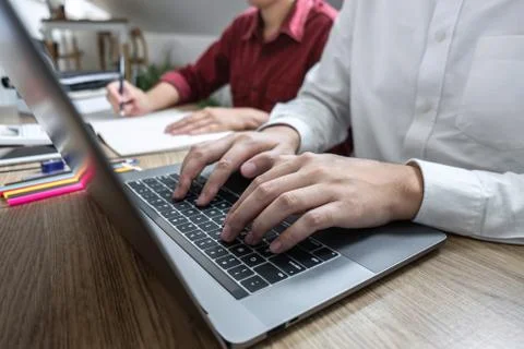 Teaching helping and study course, Team of young teacher or tutor helps stude Stock Photos